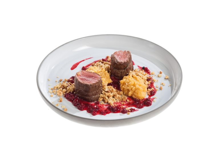 Veal tenderloin with quince puree and lingonberry sauce
